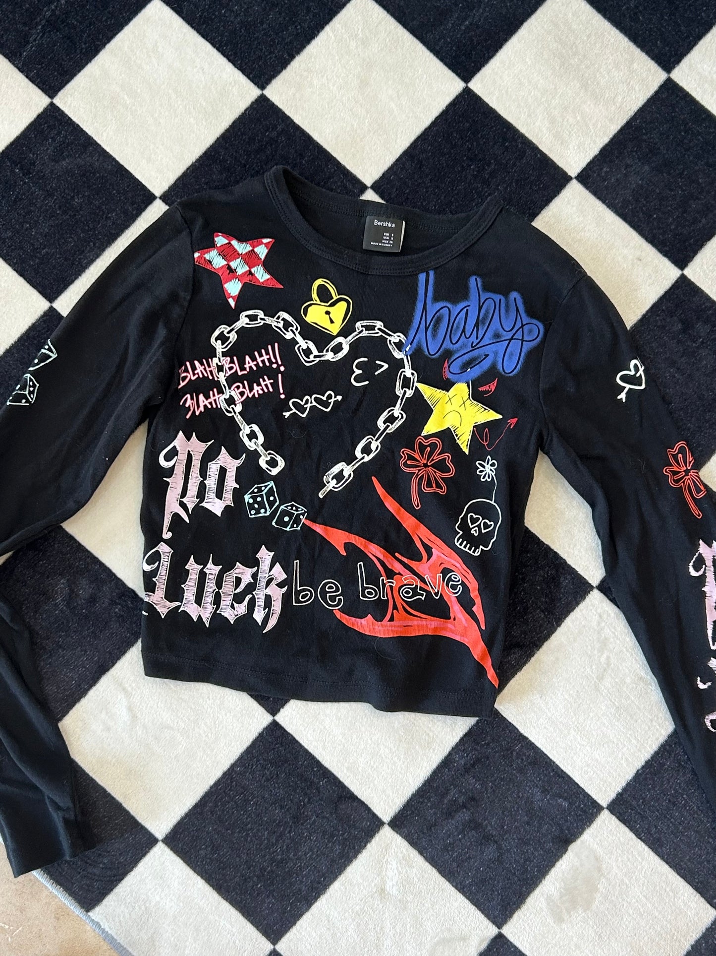 Blusa top manga larga con dibujos