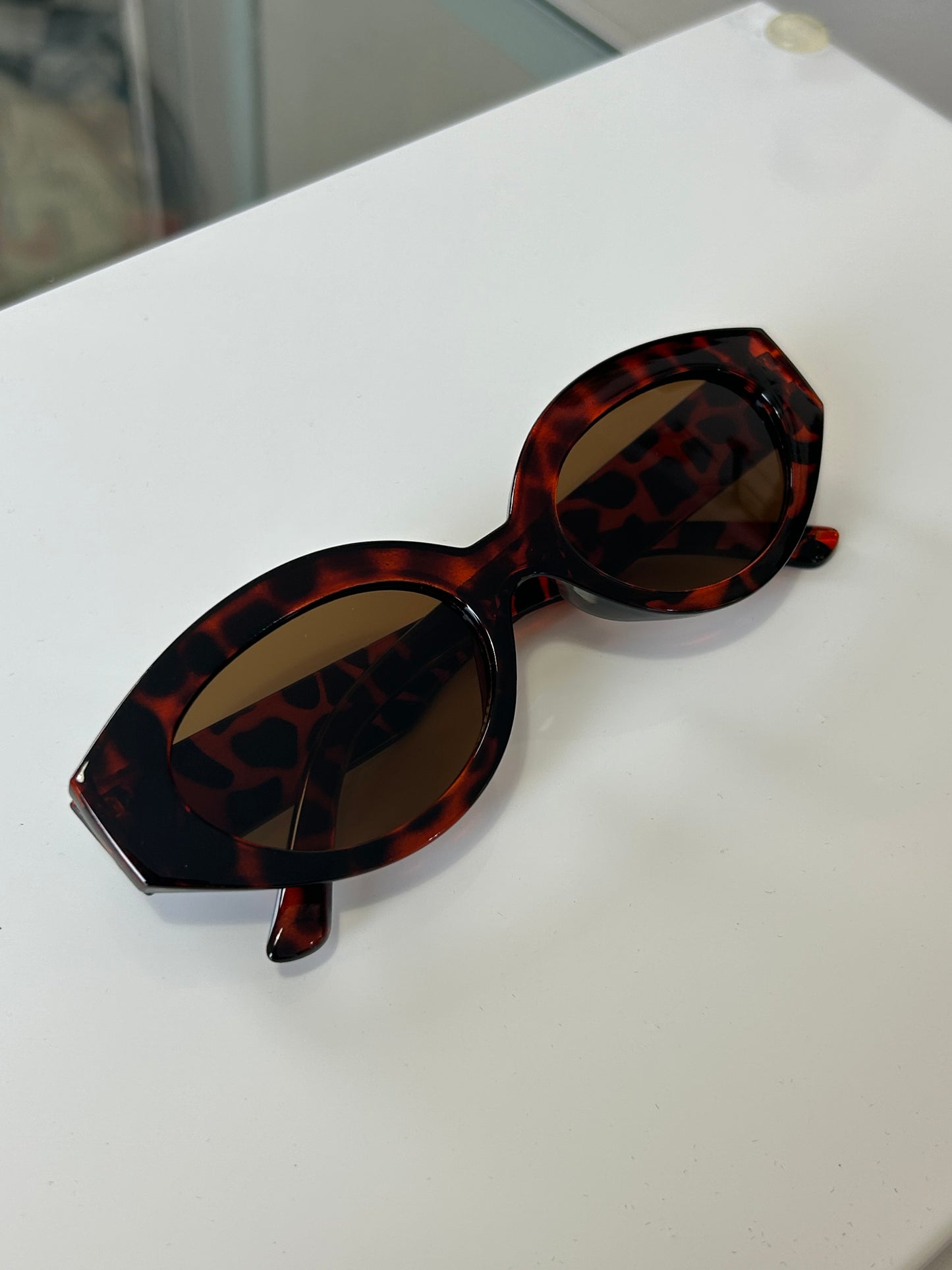Lentes ovalados grandes animal print