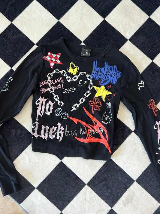 Blusa top manga larga con dibujos