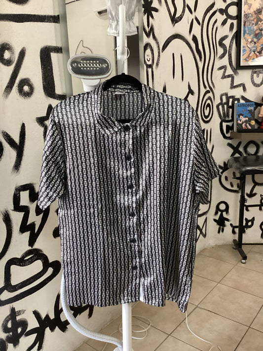 Blusa de seda de botes con patrones