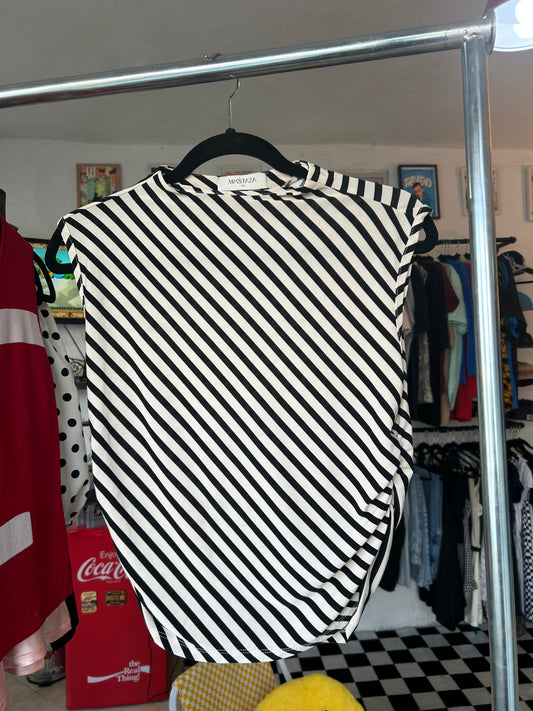 Blusa top sin mangas con rayas negras y beige