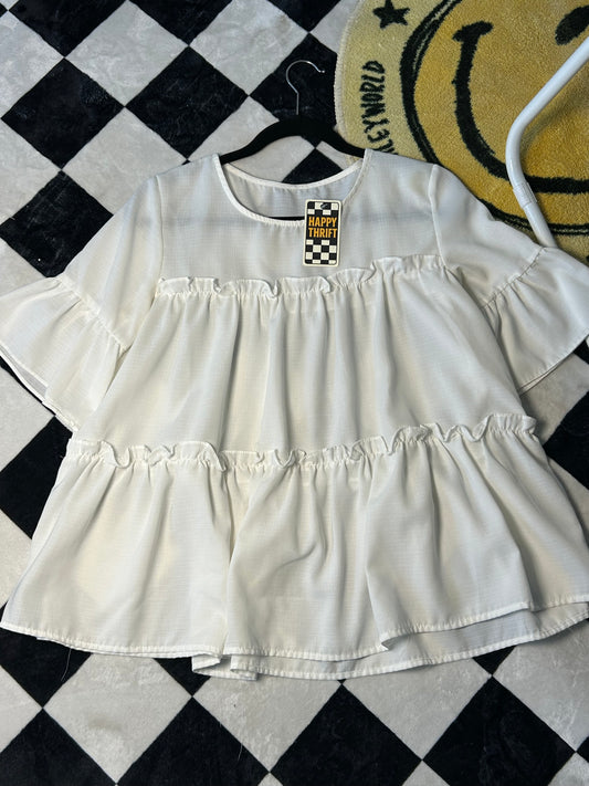 Blusa con olanes blanca